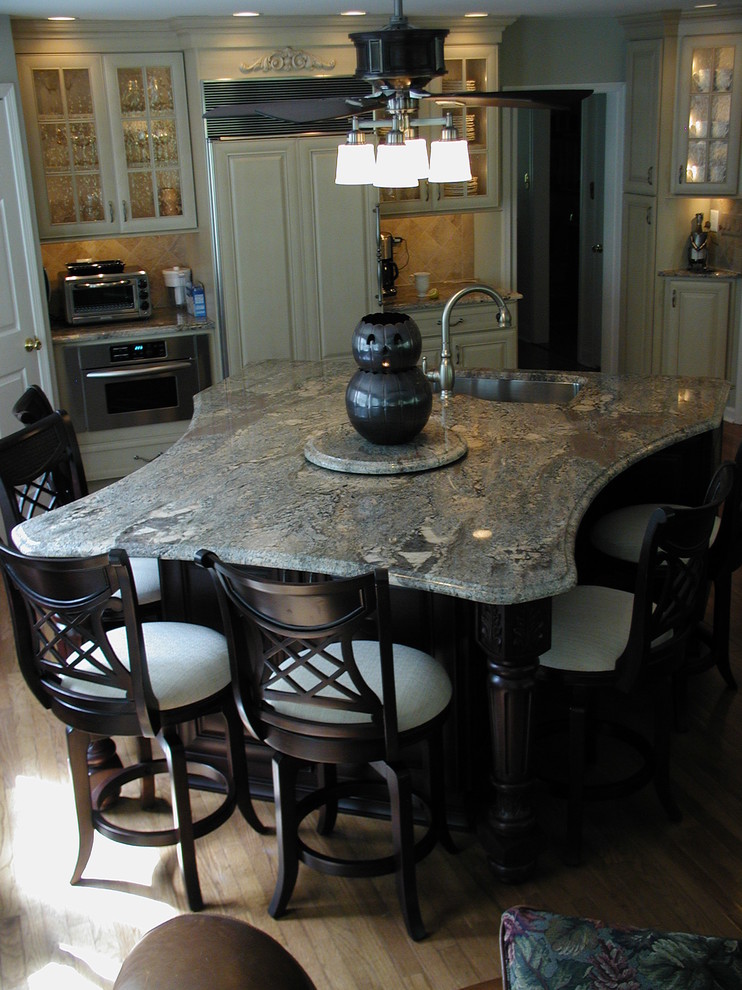 X shaped Island seats 6 in small kitchen Traditional Kitchen