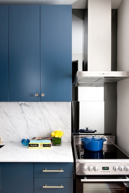 Example of a kitchen design in Toronto with marble countertops