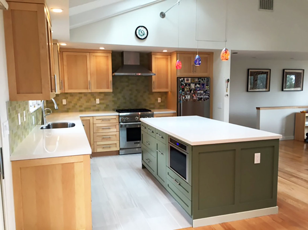 Inspiration for a small craftsman l-shaped open concept kitchen remodel in San Francisco with an undermount sink, shaker cabinets, medium tone wood cabinets, stainless steel appliances and an island