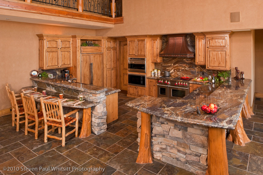 Example of a mountain style kitchen design in Raleigh