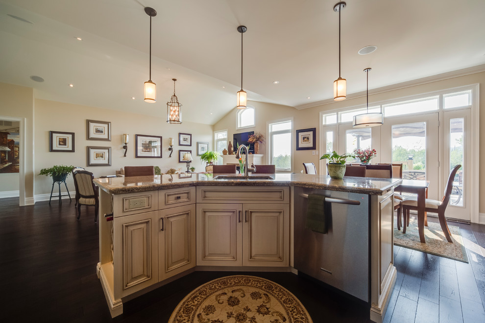 Inspiration for a timeless l-shaped open concept kitchen remodel with an undermount sink, beaded inset cabinets, medium tone wood cabinets, granite countertops, multicolored backsplash, stone slab backsplash and stainless steel appliances
