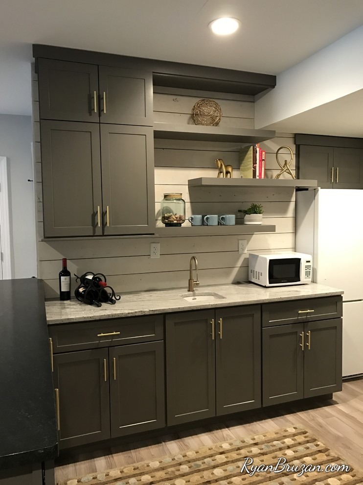 Inspiration for a contemporary l-shaped eat-in kitchen remodel in Louisville with gray cabinets, white backsplash, wood backsplash, white appliances and a peninsula