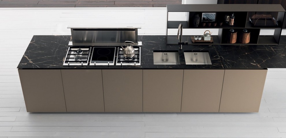 This is an example of a modern kitchen in DC Metro with dark wood cabinets.