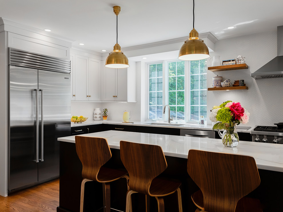 Eat-in kitchen - transitional l-shaped eat-in kitchen idea in Providence with an undermount sink, quartzite countertops, stainless steel appliances and an island