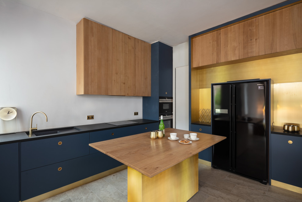 Example of a trendy kitchen design in Manchester
