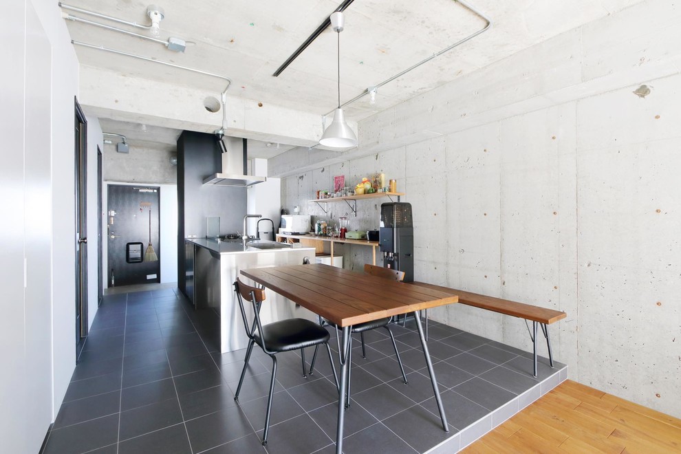 Eat-in kitchen - industrial gray floor eat-in kitchen idea in Tokyo