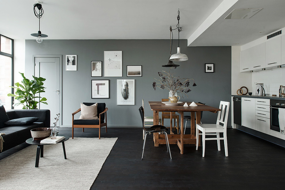 Bild på ett mellanstort minimalistiskt kök, med målat trägolv