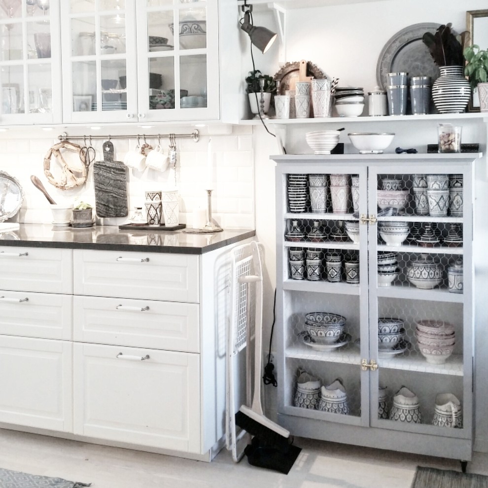 Example of a cottage kitchen design in Stockholm