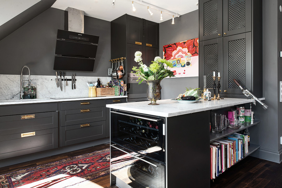Inspiration for a medium sized industrial galley open plan kitchen in Gothenburg with a single-bowl sink, recessed-panel cabinets, grey cabinets, marble worktops, grey splashback, stainless steel appliances, dark hardwood flooring and no island.