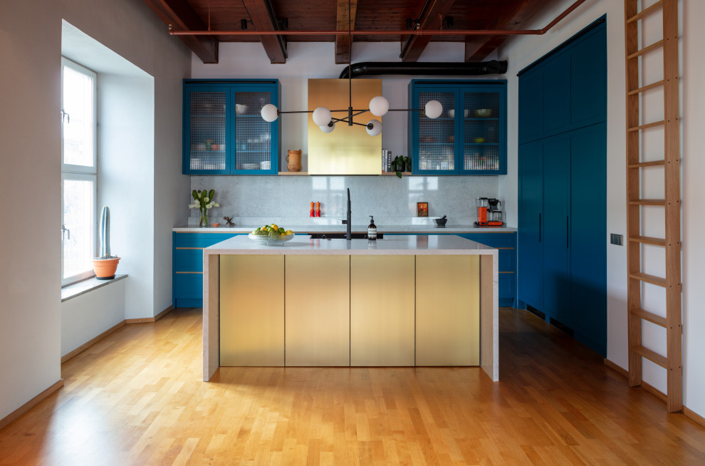 Design ideas for an urban l-shaped open plan kitchen in Stockholm with shaker cabinets.