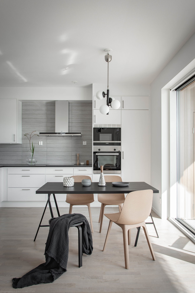 This is an example of a scandi kitchen in Orebro.