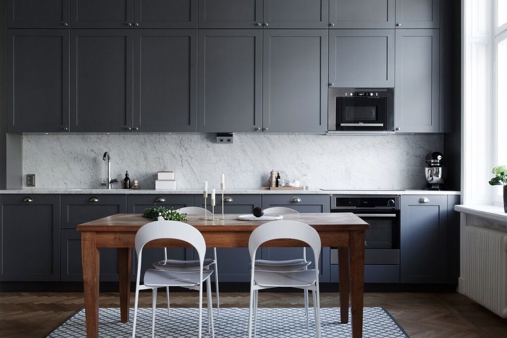 Contemporary kitchen in Stockholm with recessed-panel cabinets, grey cabinets and no island.