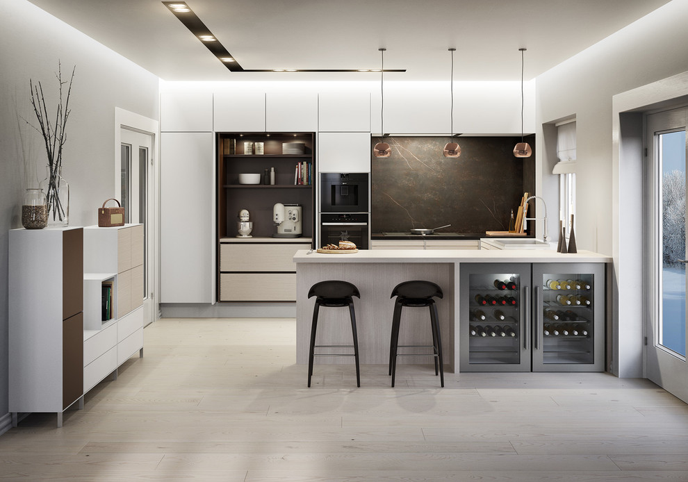Ispirazione per un cucina con isola centrale minimalista di medie dimensioni con ante bianche