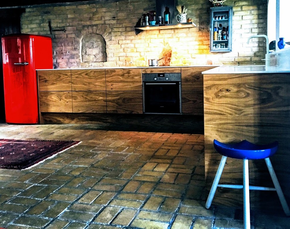 Rustic l-shaped kitchen in Aarhus with no island.