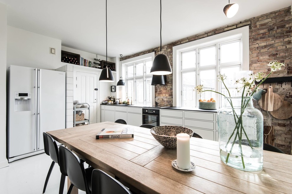 Esempio di una cucina a L scandinava di medie dimensioni