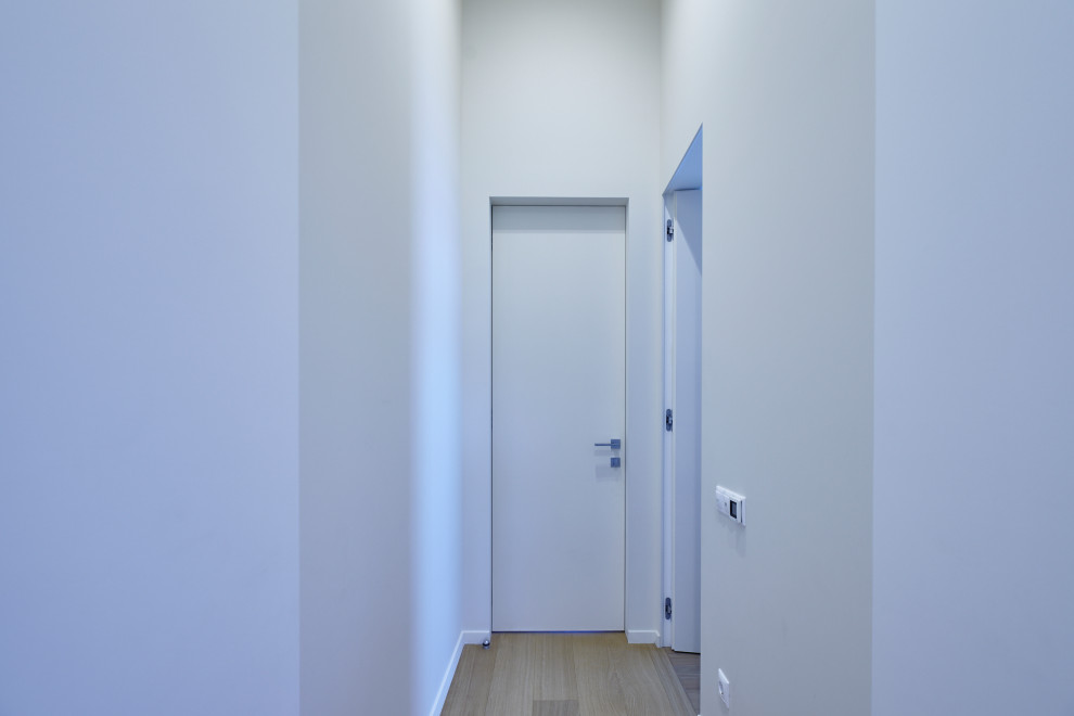 Ispirazione per un ingresso o corridoio minimal di medie dimensioni