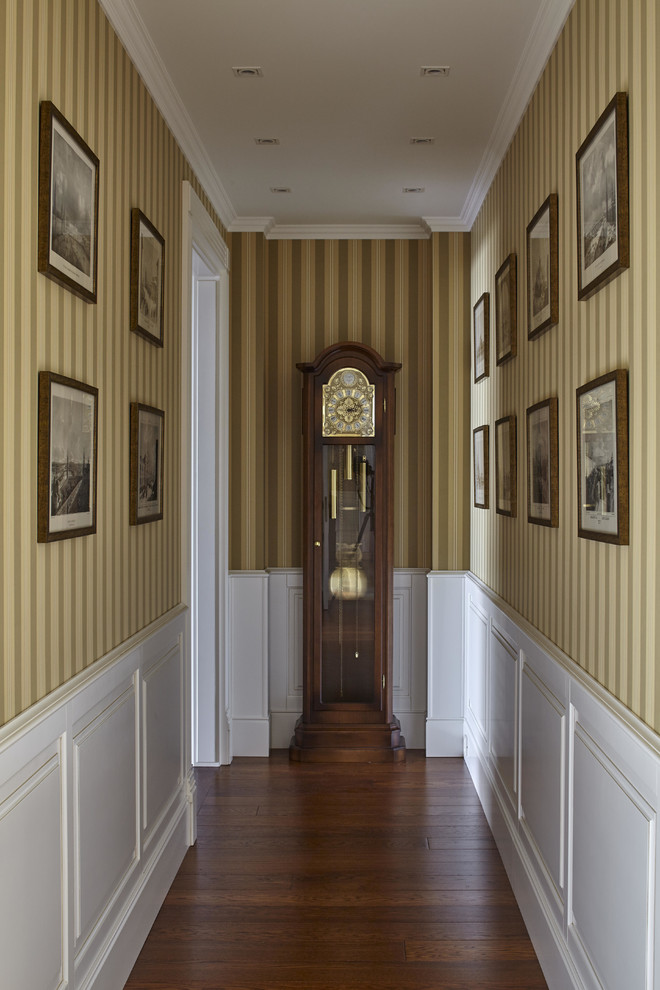 Inspiration for a timeless medium tone wood floor hallway remodel in Moscow with beige walls