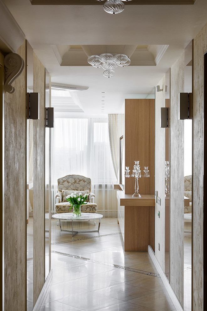 Example of a mid-sized eclectic ceramic tile and beige floor hallway design in Saint Petersburg with beige walls