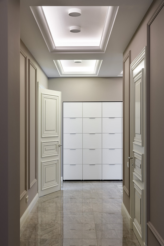 Inspiration for a contemporary beige floor hallway remodel in Saint Petersburg with beige walls