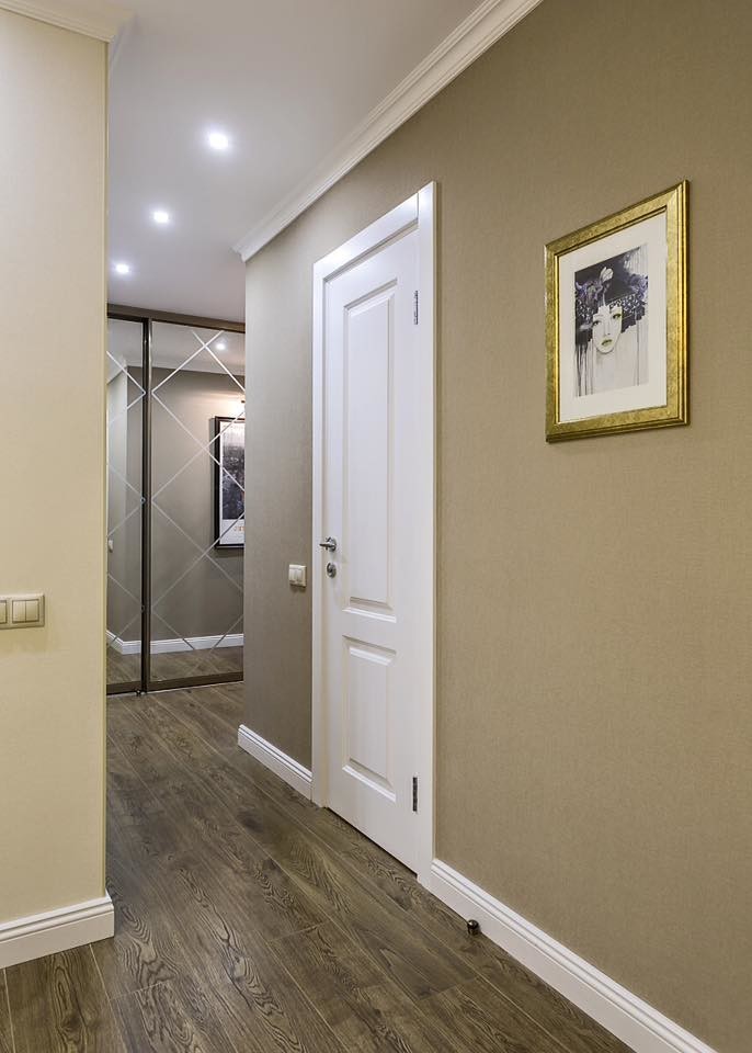 Small transitional dark wood floor and brown floor hallway photo in Moscow with brown walls