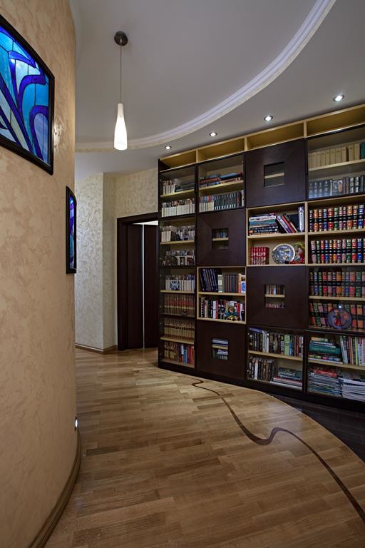 Large minimalist light wood floor hallway photo in Moscow with beige walls