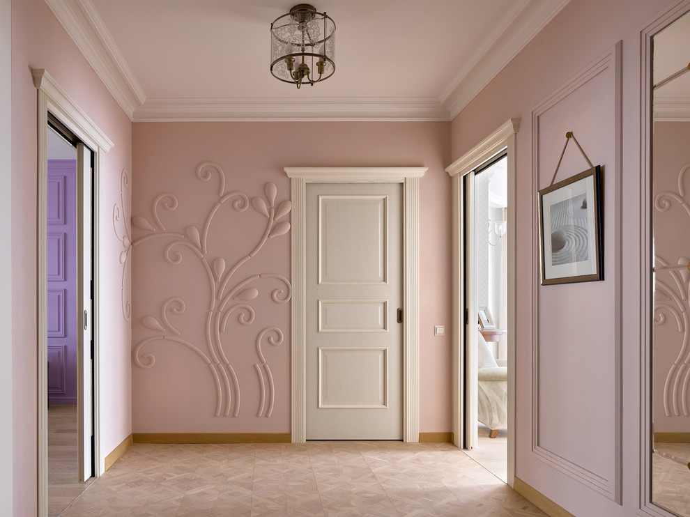 Example of a transitional beige floor hallway design in Other with pink walls