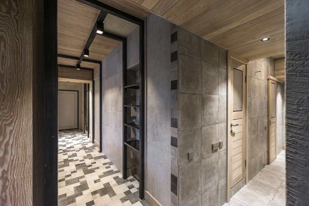 Свежая идея для дизайна: коридор среднего размера: освещение в современном стиле с серыми стенами, полом из керамической плитки и серым полом - отличное фото интерьера