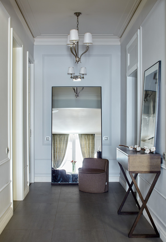 Hallway - transitional porcelain tile hallway idea in Moscow with gray walls
