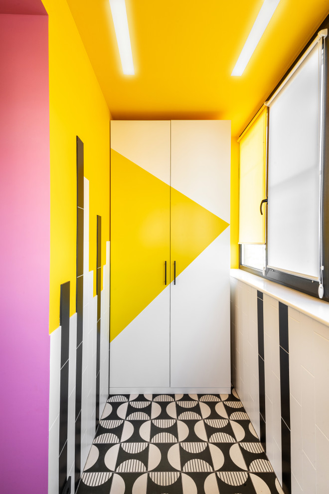 Inspiration for a contemporary multicolored floor hallway remodel in Other with multicolored walls