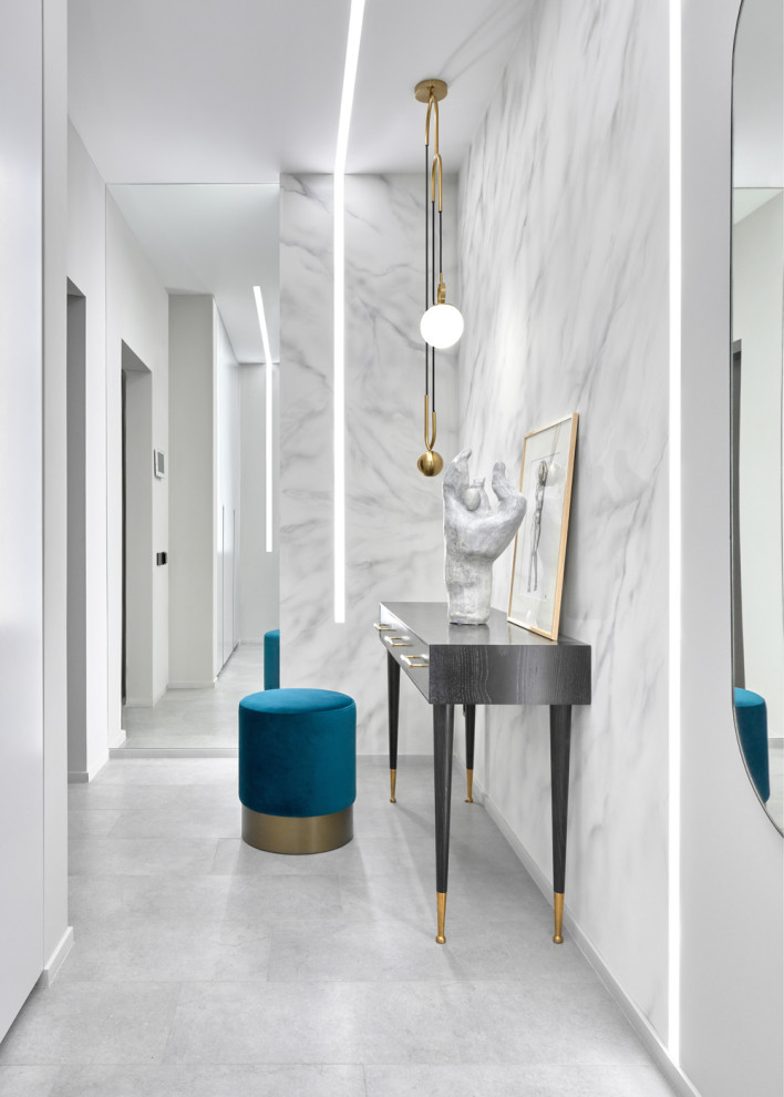 Example of a mid-sized trendy white floor hallway design in Moscow with white walls