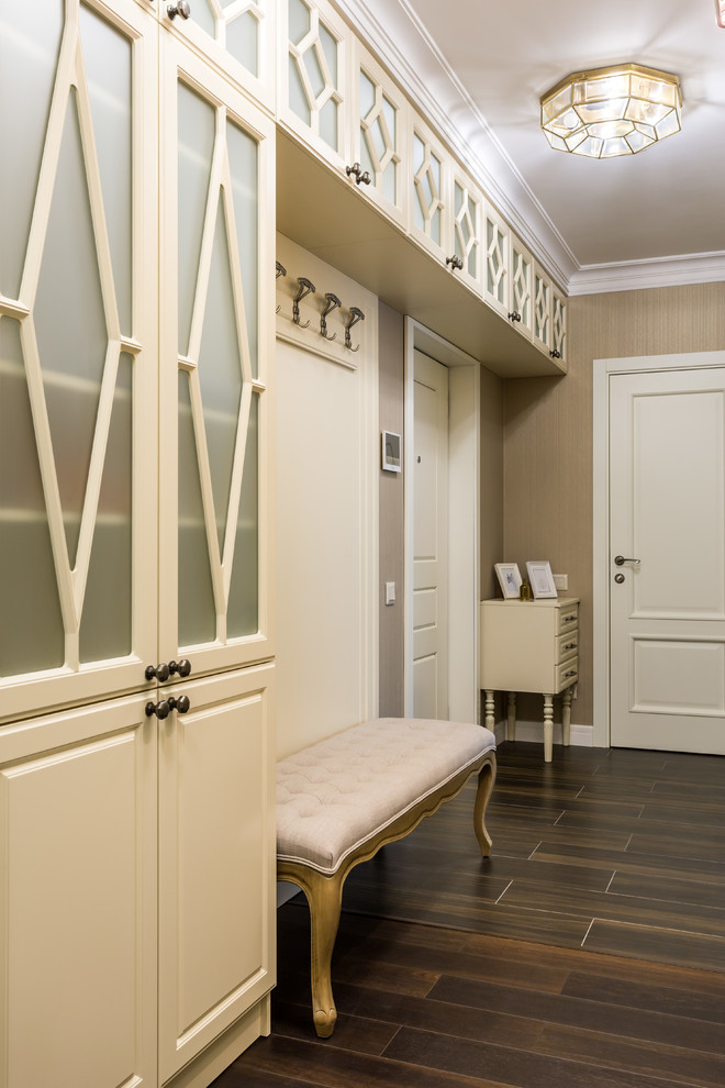 Example of a large ceramic tile hallway design in Saint Petersburg with beige walls