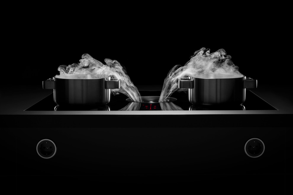 Idee per una cucina minimal con elettrodomestici neri e top grigio