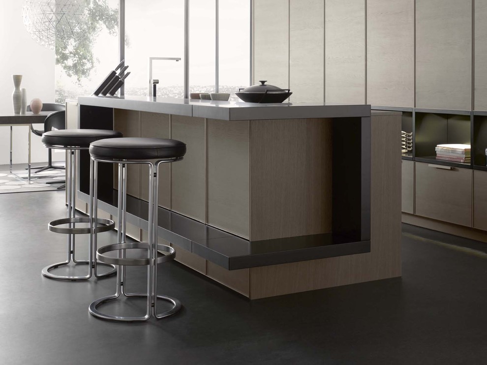 Medium sized modern open plan kitchen in Stuttgart with flat-panel cabinets, dark wood cabinets and an island.