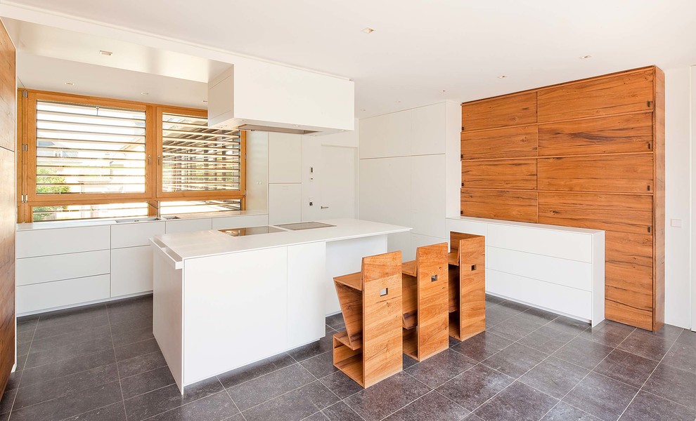 Inspiration for a scandinavian kitchen in Other with a double-bowl sink, flat-panel cabinets, white cabinets, window splashback, an island and grey floors.