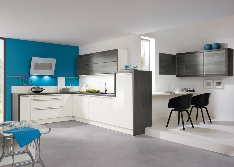 Design ideas for a medium sized modern l-shaped kitchen in Berlin with white cabinets and wood worktops.