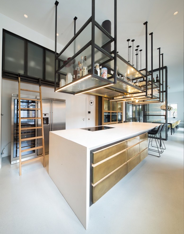 Design ideas for a large contemporary enclosed kitchen in Frankfurt with a submerged sink, beaded cabinets, concrete worktops, black splashback, black appliances, concrete flooring, an island and grey floors.