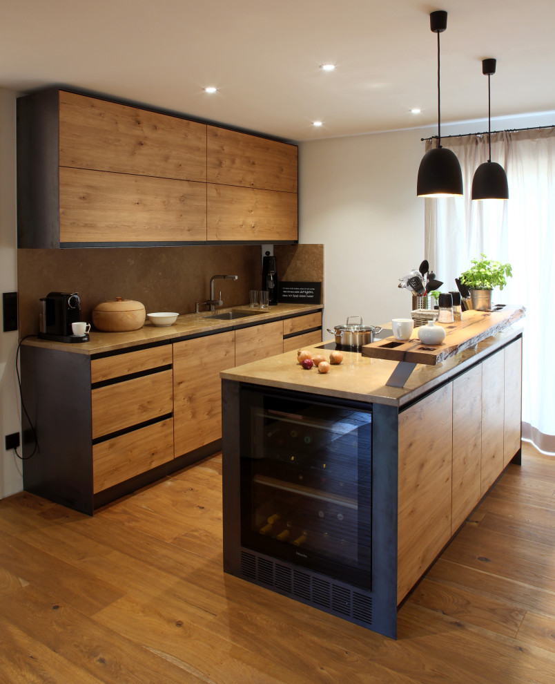 Inspiration for a mid-sized contemporary galley medium tone wood floor and brown floor kitchen remodel in Munich with an undermount sink, flat-panel cabinets, medium tone wood cabinets, wood countertops, porcelain backsplash, paneled appliances, an island and beige countertops