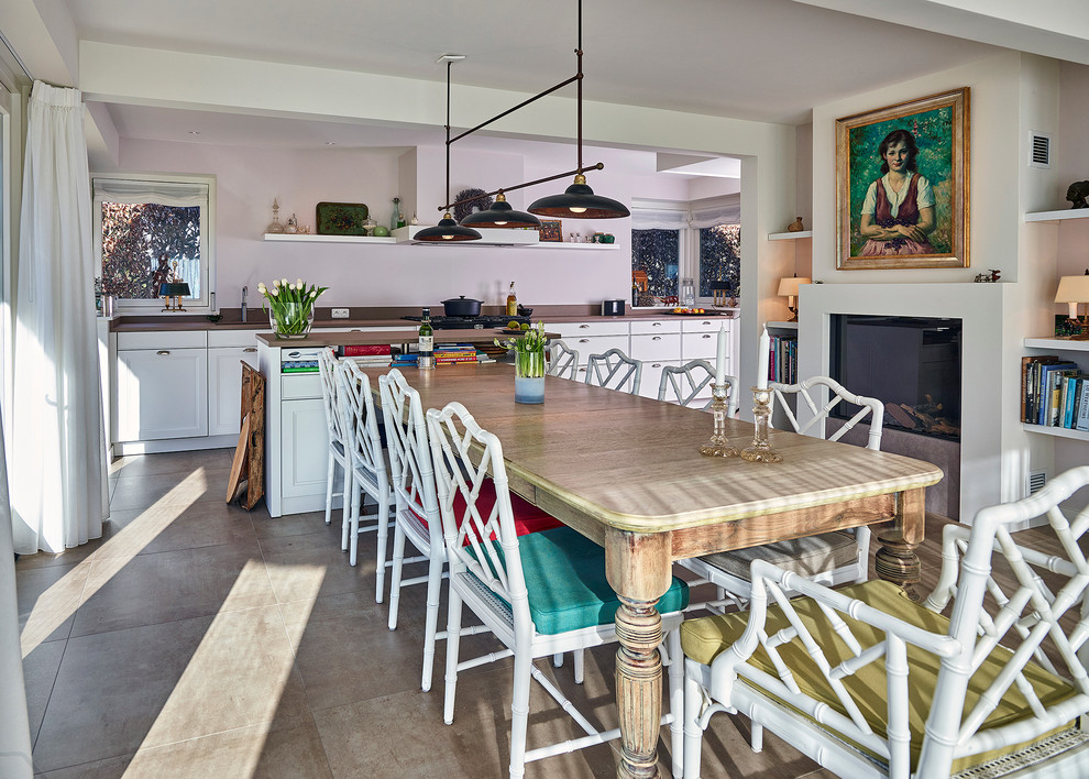Example of a huge cottage single-wall medium tone wood floor eat-in kitchen design in Other with beaded inset cabinets, white cabinets and an island