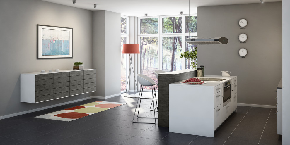 Immagine di una cucina design con ante bianche, top in legno, paraspruzzi beige, elettrodomestici in acciaio inossidabile e pavimento in gres porcellanato