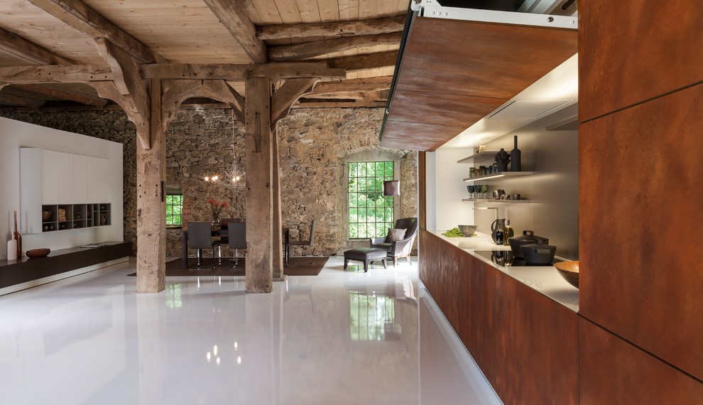 На фото: кухня в стиле рустика с белым полом и шторами на окнах с