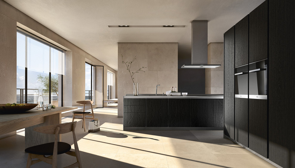 This is an example of a large contemporary u-shaped kitchen/diner in Munich with flat-panel cabinets, black cabinets, grey splashback, black appliances, ceramic flooring and an island.