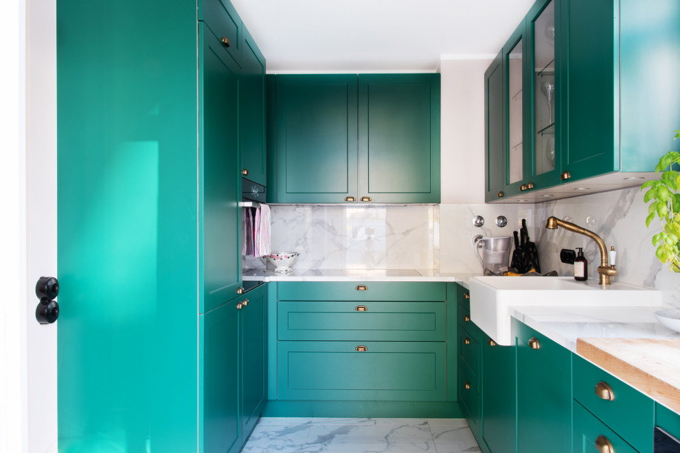 Inspiration for a small traditional u-shaped open plan kitchen in Munich with an integrated sink, beaded cabinets, green cabinets, marble worktops, white splashback, marble splashback, marble flooring, no island, white floors and white worktops.