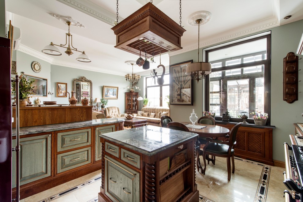 Inspiration for a medium sized victorian u-shaped open plan kitchen in Moscow with a belfast sink, raised-panel cabinets, green cabinets, tile countertops, beige splashback, ceramic splashback, coloured appliances, ceramic flooring, an island and beige floors.