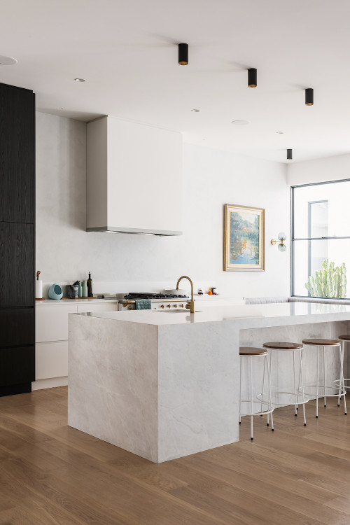 Marble Magic: Elevate Your Kitchen with a Marble Kitchen Island and White Cabinets