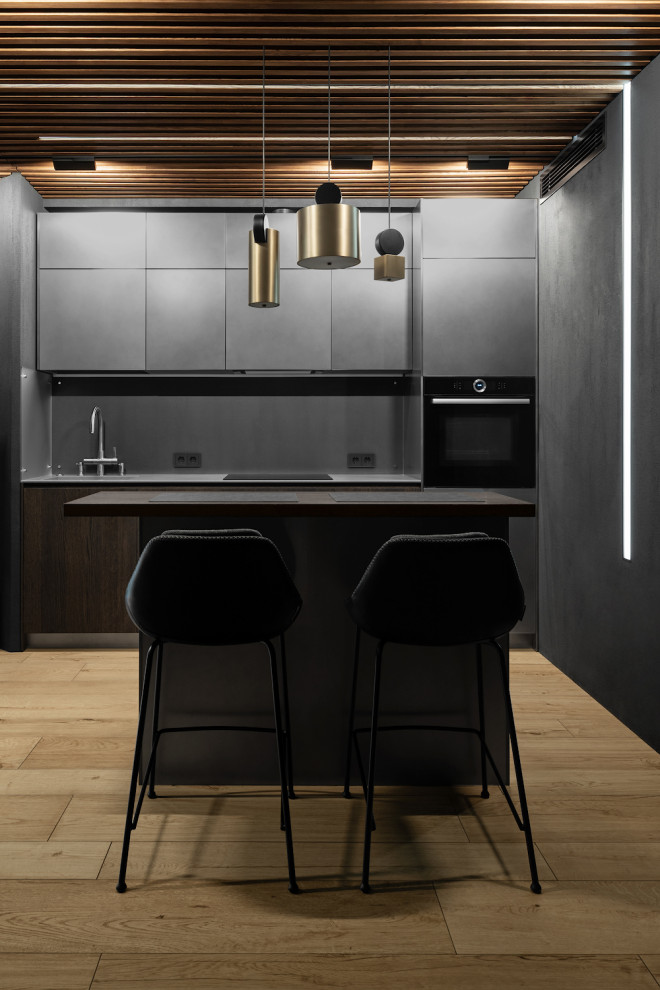 Photo of a medium sized contemporary kitchen in Moscow with porcelain flooring.