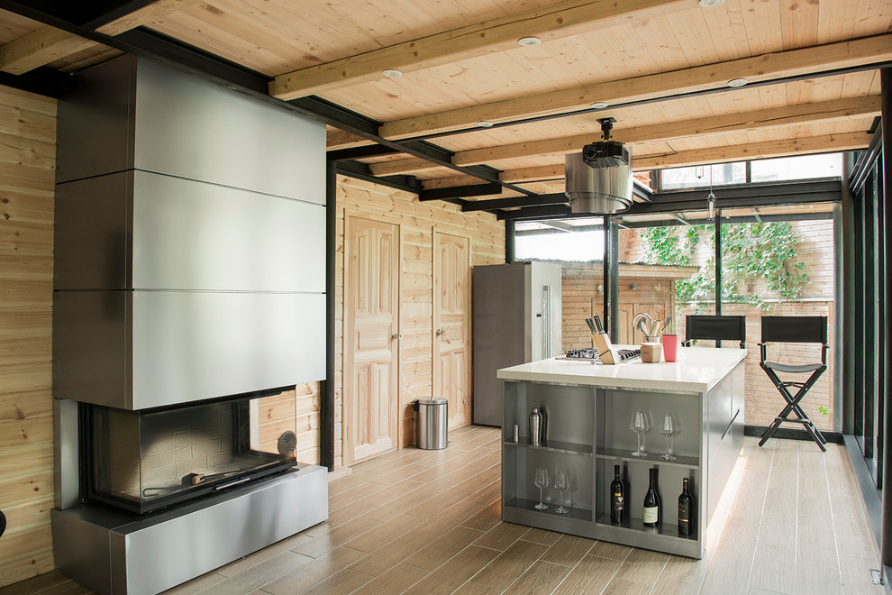 Idéer för ett mellanstort modernt vit kök med öppen planlösning, med släta luckor, skåp i rostfritt stål och en köksö