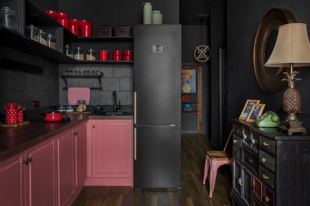Design ideas for a medium sized urban grey and pink l-shaped open plan kitchen in Moscow with raised-panel cabinets, wood worktops, black splashback, porcelain splashback, laminate floors, no island, brown floors, brown worktops and a built-in sink.