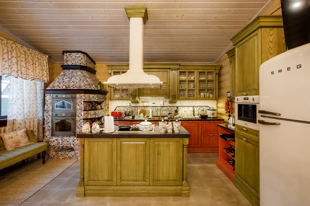 This is an example of a rural l-shaped kitchen in Yekaterinburg with raised-panel cabinets, green cabinets, an island, brown floors, brown worktops and white appliances.