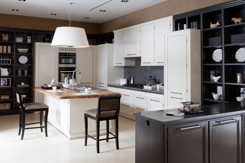 Example of a transitional white floor kitchen design in Moscow with a drop-in sink, recessed-panel cabinets, white cabinets, gray backsplash, stainless steel appliances, an island and gray countertops