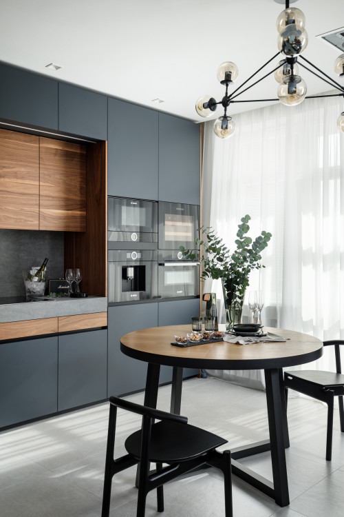 Elegant Eat-in Kitchen with Circular Dining Table: Black Modern Cabinet Inspirations